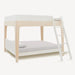 A modern full size wooden bunk bed with a light natural wood frame, white headboard and footboard, and a white ladder, shown against a plain off-white background.