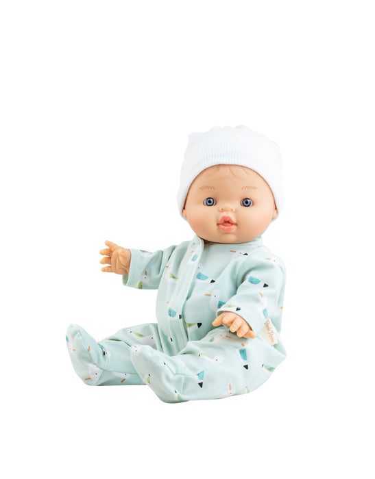 Baby doll in a light blue outfit with a white hat on a white background