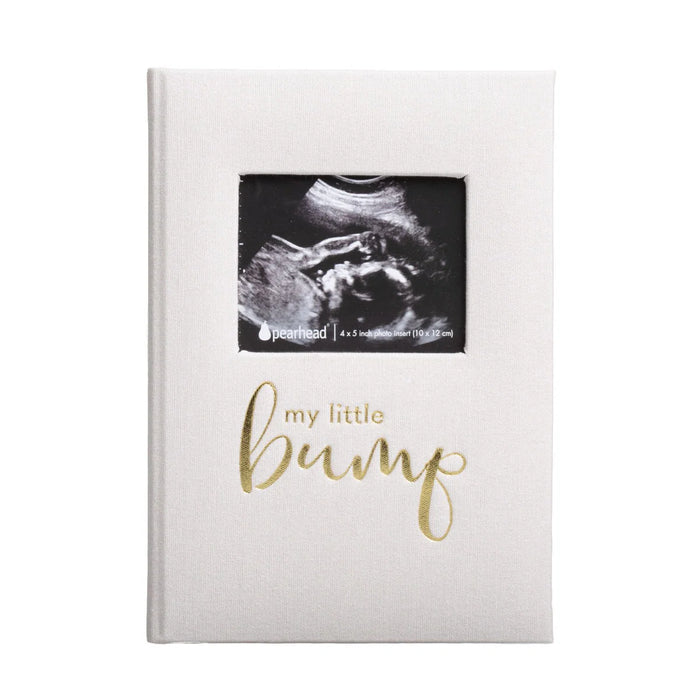 White album with 'my little bump' text and ultrasound photo on a white background