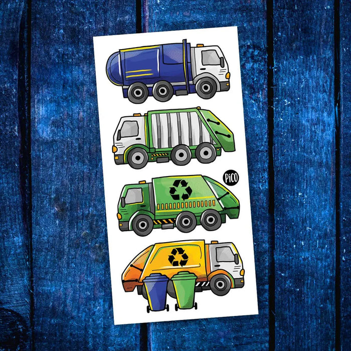 Sheet of temporary tattoos featuring colorful recycling trucks on a blue wooden background.