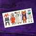 Set of Halloween-themed animal tattoos on a white card with a purple background