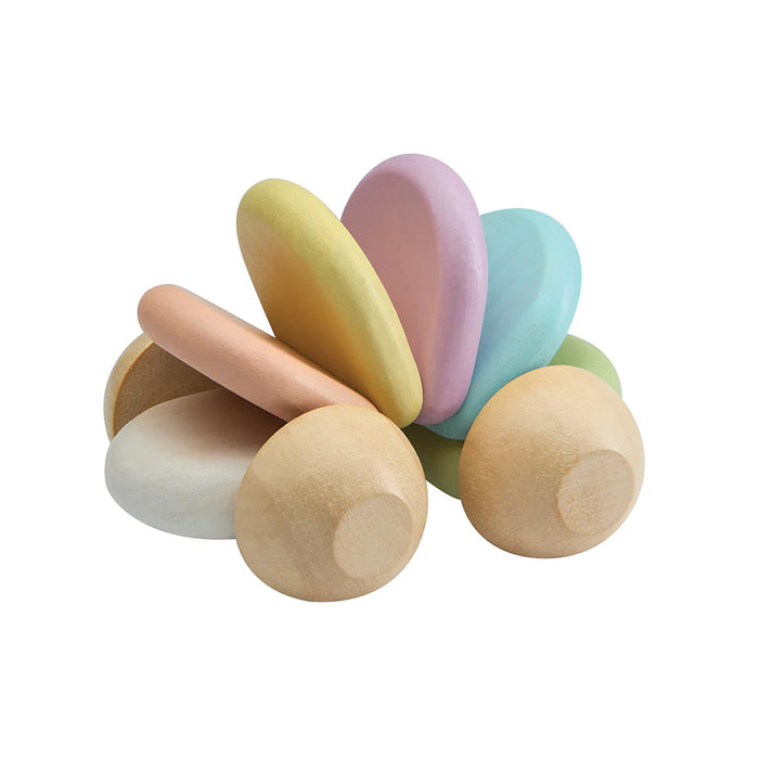 Colourful wooden shapes form a baby safe toy car on a white background