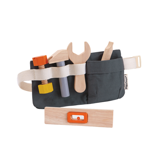 Toy tool belt with various tools on a white background