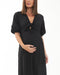 Black dress with a knot detail on a white background