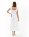 Woman wearing a white pregnancy dress on a white background