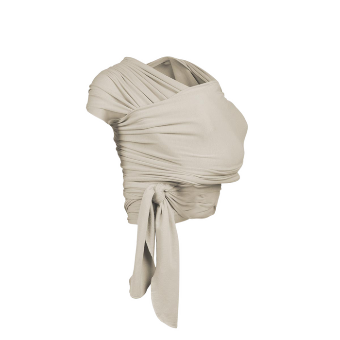 Beige draped top on a white background