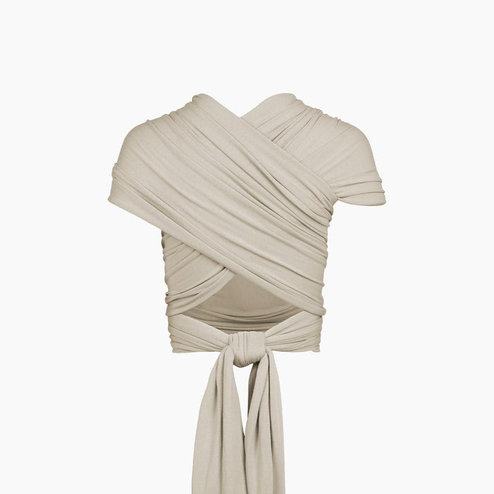 Beige draped top on a white background