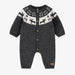 Knitted baby romper with reindeer pattern on a white background
