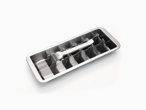 Metallic ice cube tray with multiple compartments on a white background