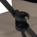 Black cup holder attached to a beige stroller pod. Sold separately