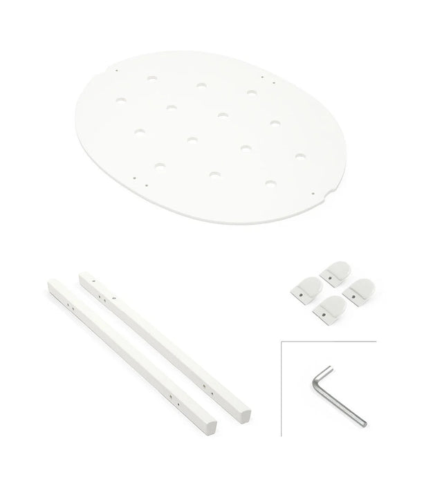 White parts for crib assembly shown on white background