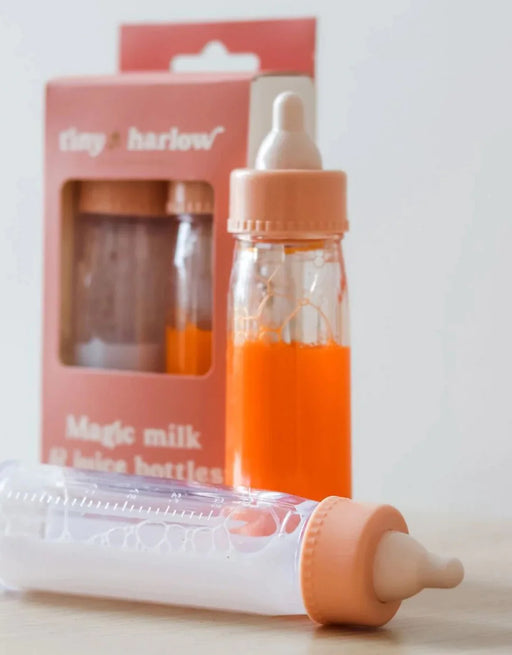 caption-Magic Milk and Juice Baby Doll Bottles