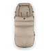 Beige baby stroller footmuff on a white background
