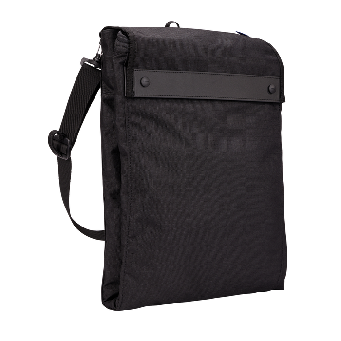 Black stroller bag compactly folded and protective trim shown on a white background