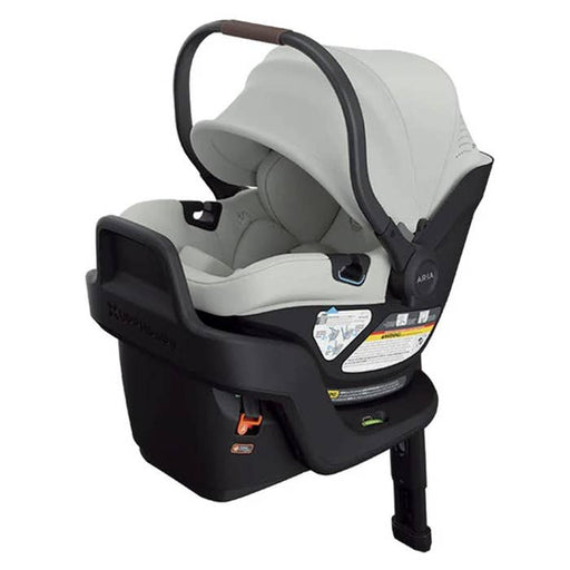 Baby car seat with gray cover and black base on a white background