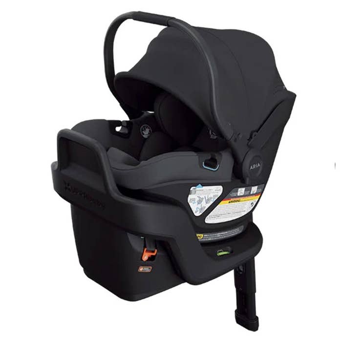Black baby car seat on a white background