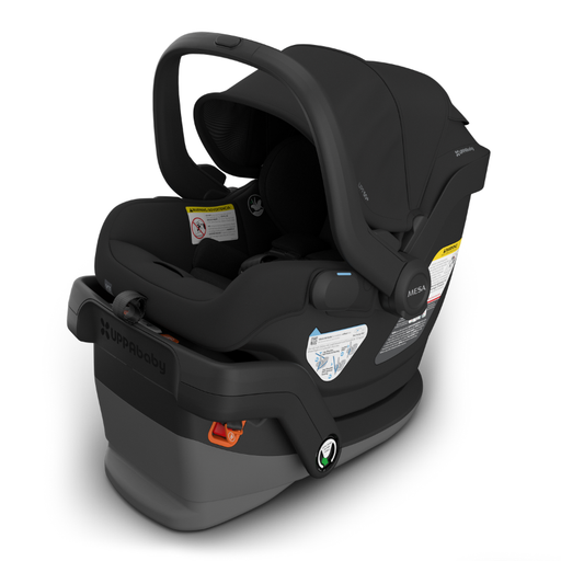 Black UPPAbaby Mesa V3 infant car seat with base on a white background