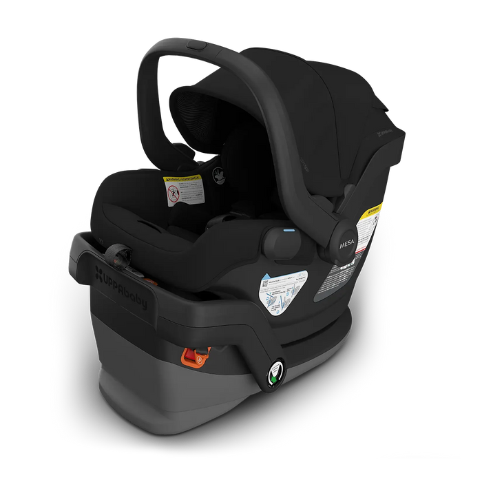Black UPPAbaby Mesa car seat with base on a white background