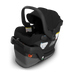 Black UPPAbaby Mesa car seat with base on a white background