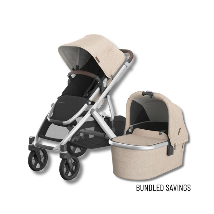 Stroller with attached bassinet on a white background