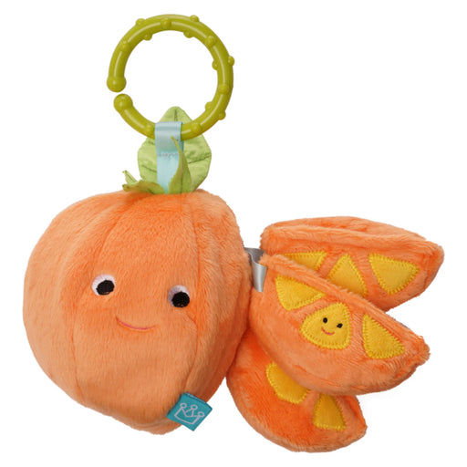 Plush toy with a pumpkin design and a baby rattle on a white background