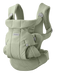 Light  green mesh and canvas baby carrier with buckles on white background with Baby Bjorn logo on front. 