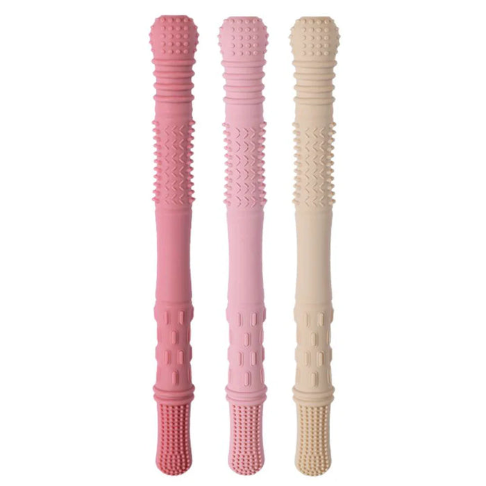 Three textured sticks in pink and beige on a white background