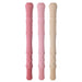 Three textured sticks in pink and beige on a white background
