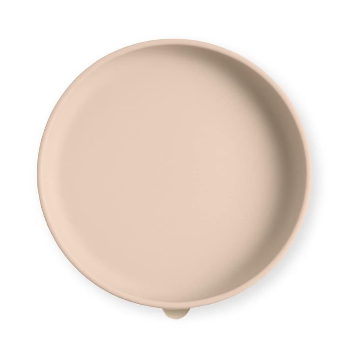 Beige silicone plate on a white background