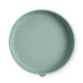 Green silicone plate on a white background