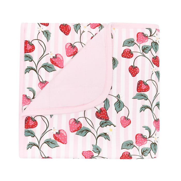 Floral patterned fabric with strawberries on a white background