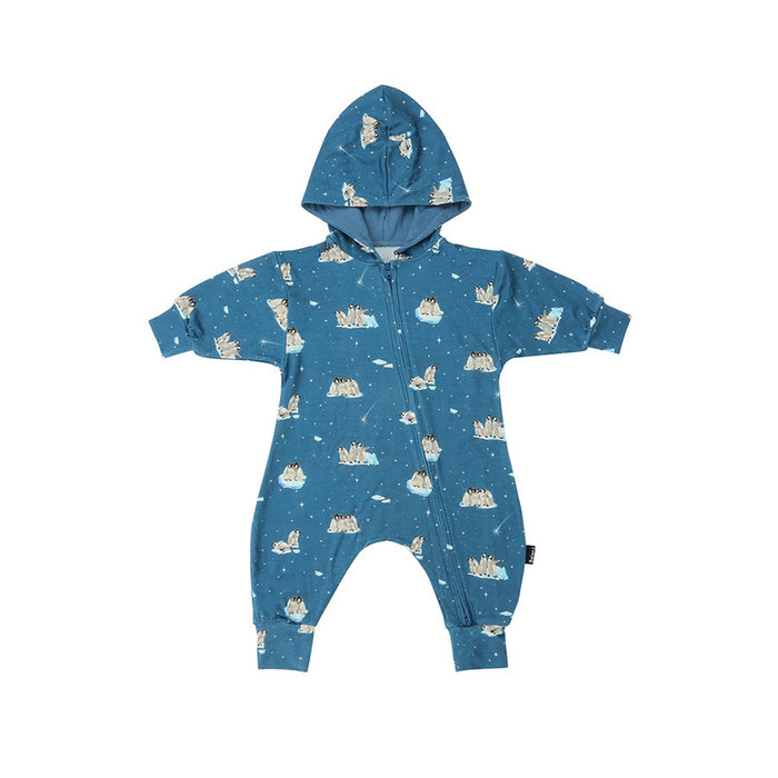 Blue baby onesie with animal print on a white background