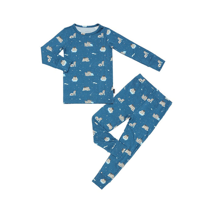 Blue children's pajama set with animal pattern on a white background
