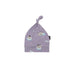 Purple baby hat with penguin design on a white background