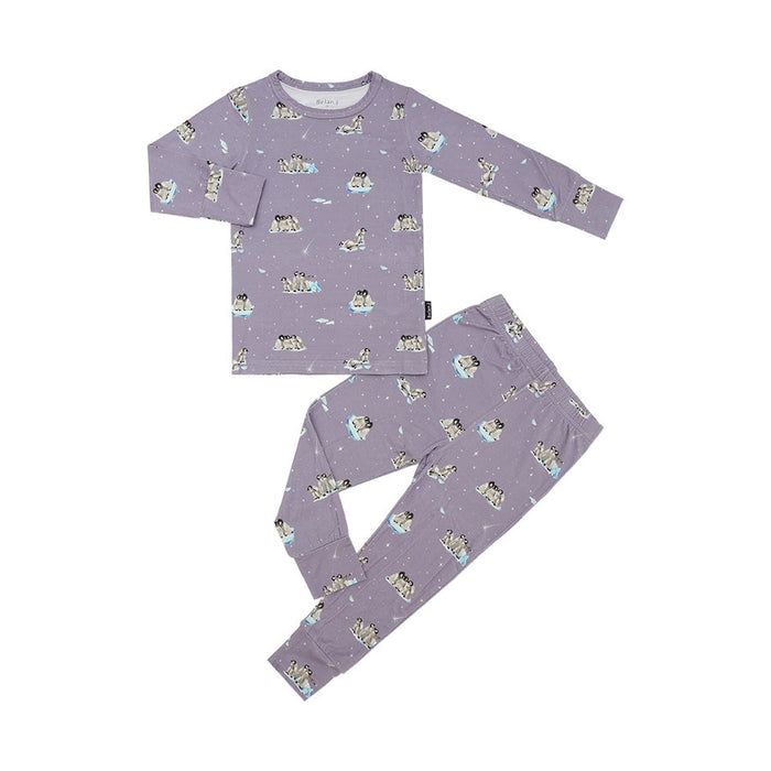 Children's pajama set with animal pattern on a white background