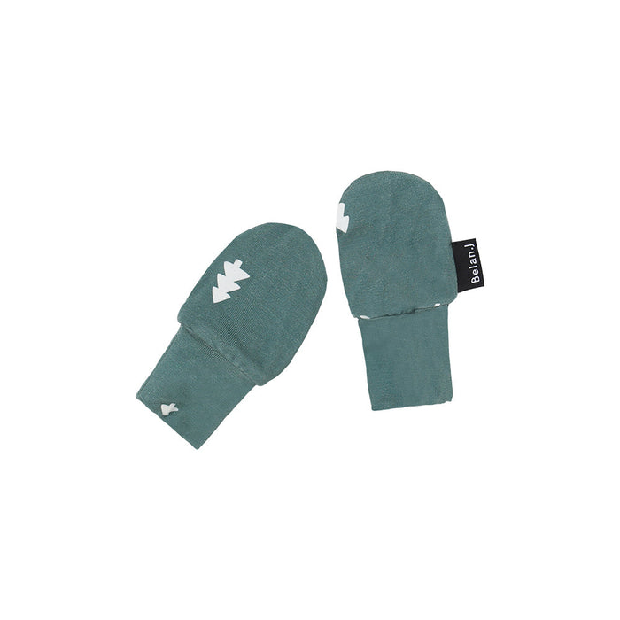 Pair of green mittens with a brand tag on a white background