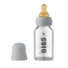 A clear glass baby bottle with a 120ml measurement scale, nipples, and a cap, branded with the name 'BIBS'.