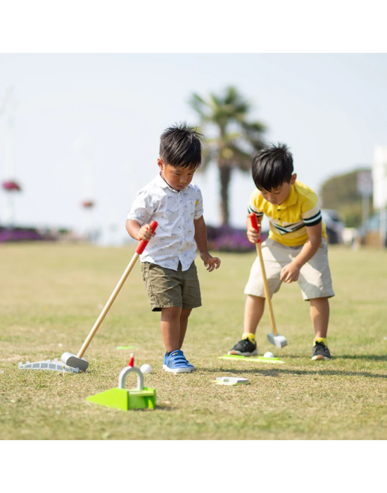 caption-Two children playing golf