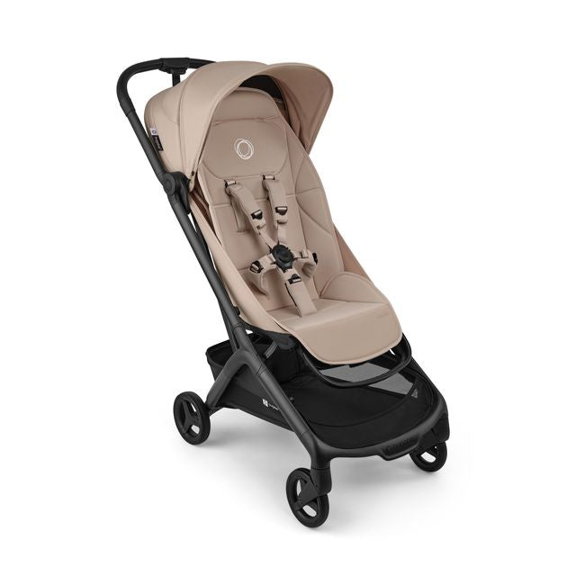 A modern Bugaboo stroller in light beige and black, shown from a three-quarters angle against a plain white background.