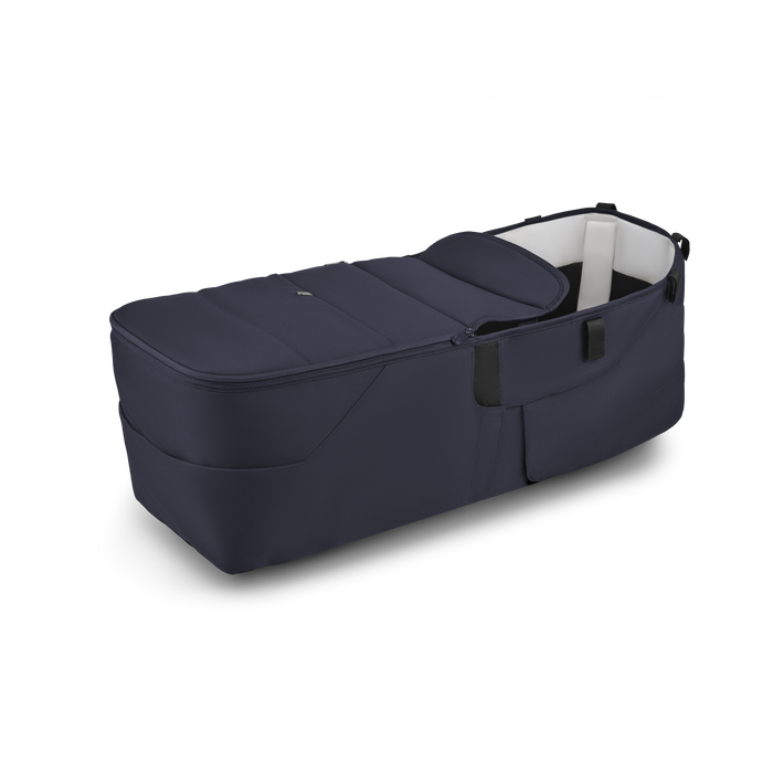 Navy blue baby bassinet on a white background