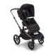 Black stroller shown with on a white background with snack tray (sold separately)