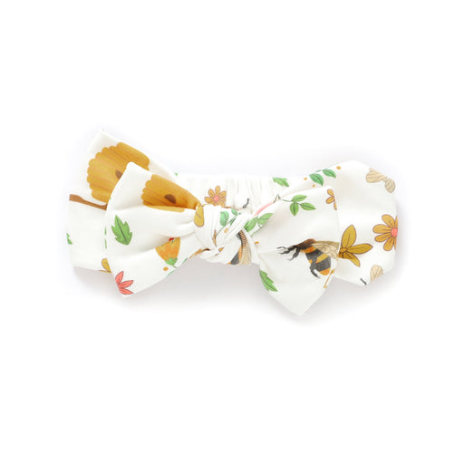 Floral bow tie with bees on a white background