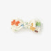 Bow tie with dinosaur pattern on a white background