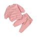Pink children's sweatshirt and pants set on a white background