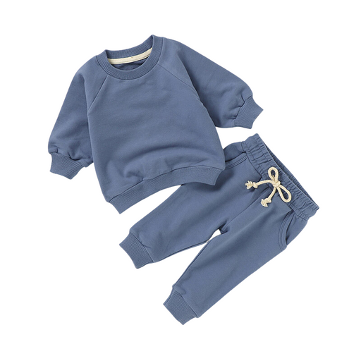 Blue children's sweatshirt and pants set on a white background