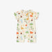 Baby romper with dinosaur pattern on a white background