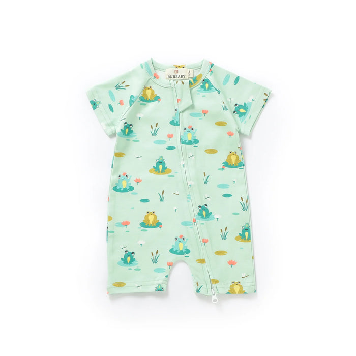 Baby romper with frog pattern on a white background