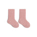 Pair of pink socks on a white background