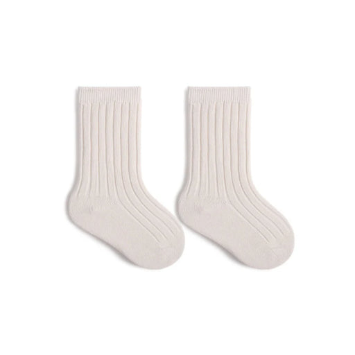 Pair of white socks on a white background