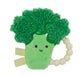 Plush broccoli toy with a smiling face on a white background